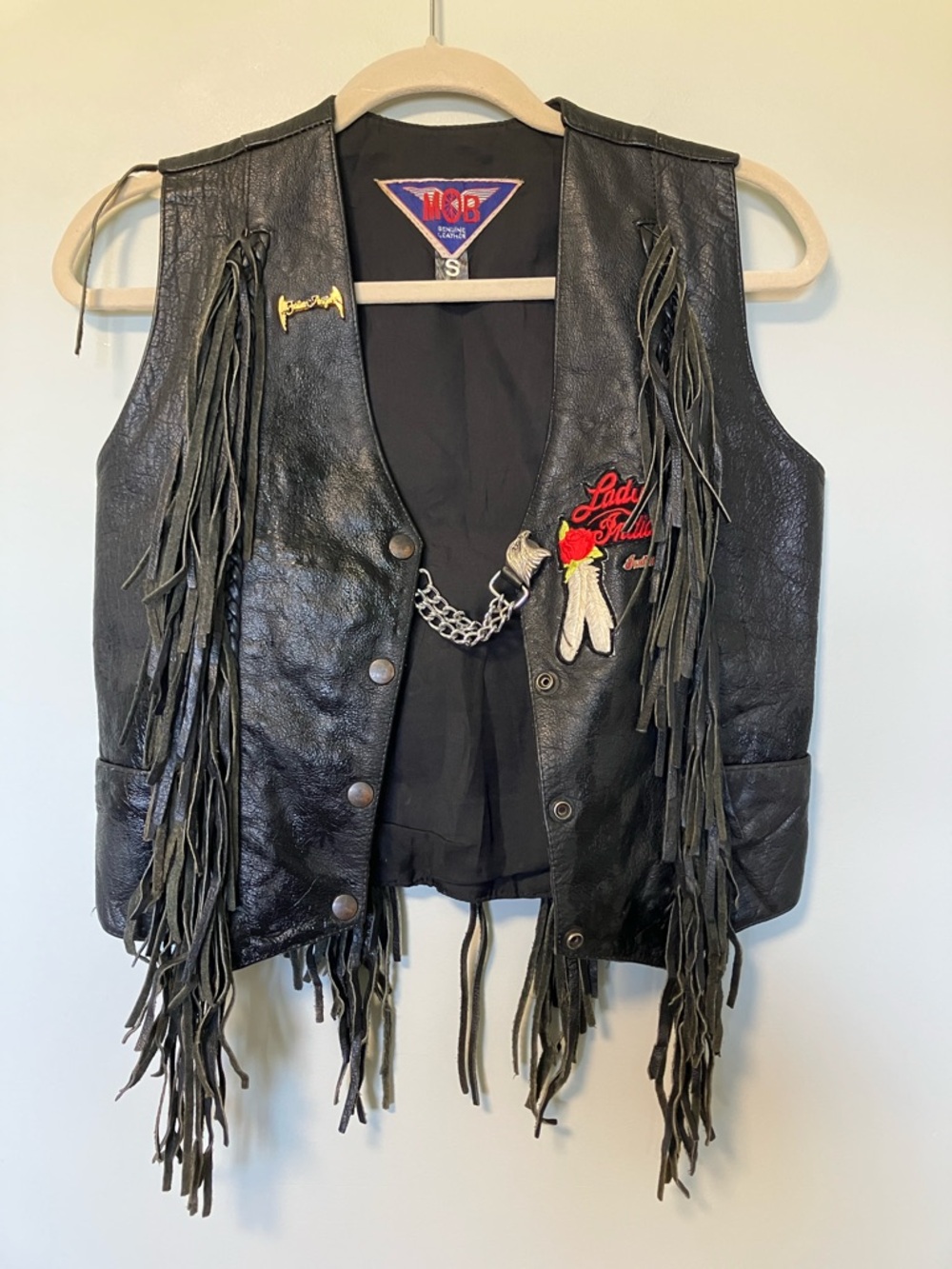 MOB Black Leather Fringe Vest with Embroidered Patch and Chain